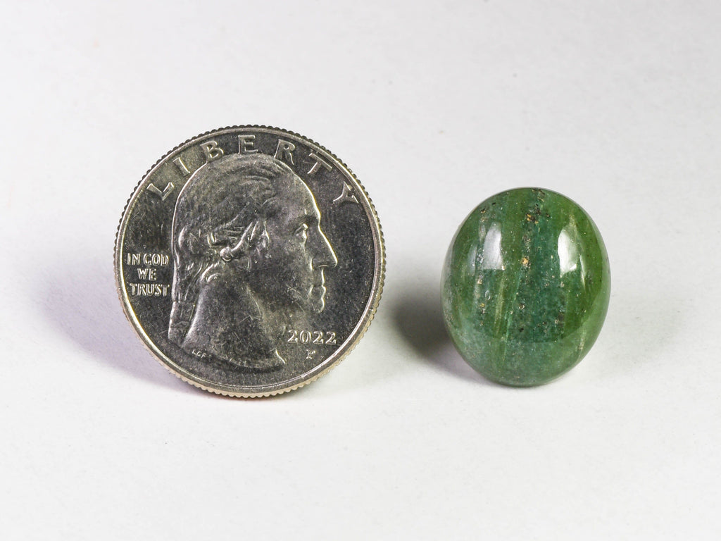 A cabochone of greenlandite or green aventurine