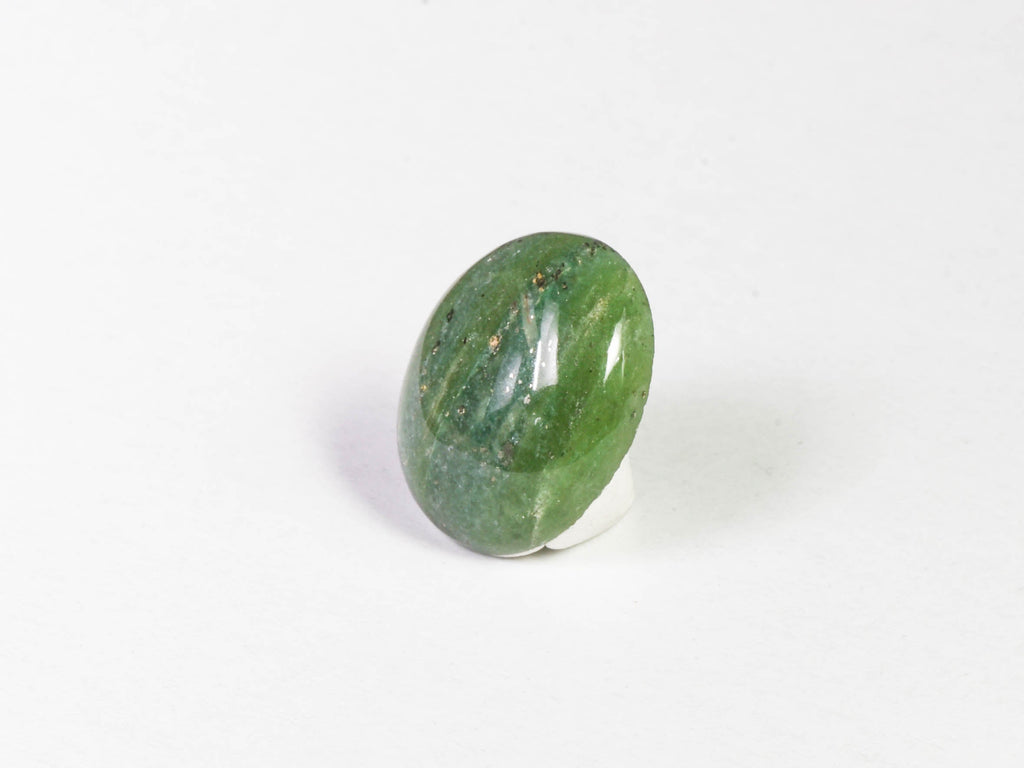 A cabochone of greenlandite or green aventurine
