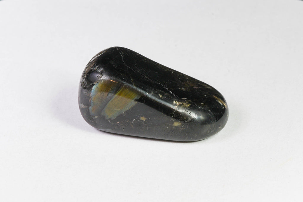 A beautiful tumbled nuummite stone