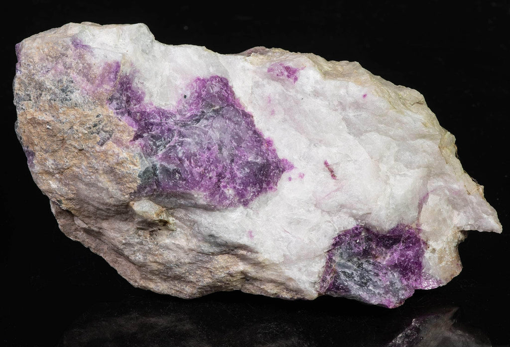 Sodalite (Hackmanite) from Greenland with deep tenebrescence.