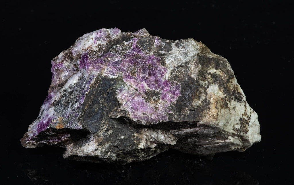 Mineral specimen of very tenebrescent blue sodalite (hackmanite)