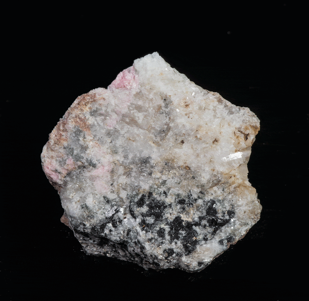 Tenebrescent Pink Tugtupite from Greenland
