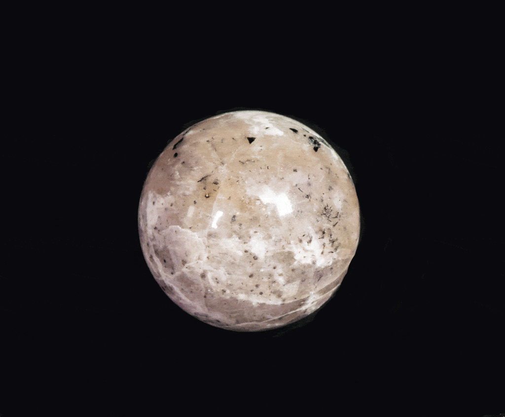 tenebrescent and fluorescent sodalite sphere