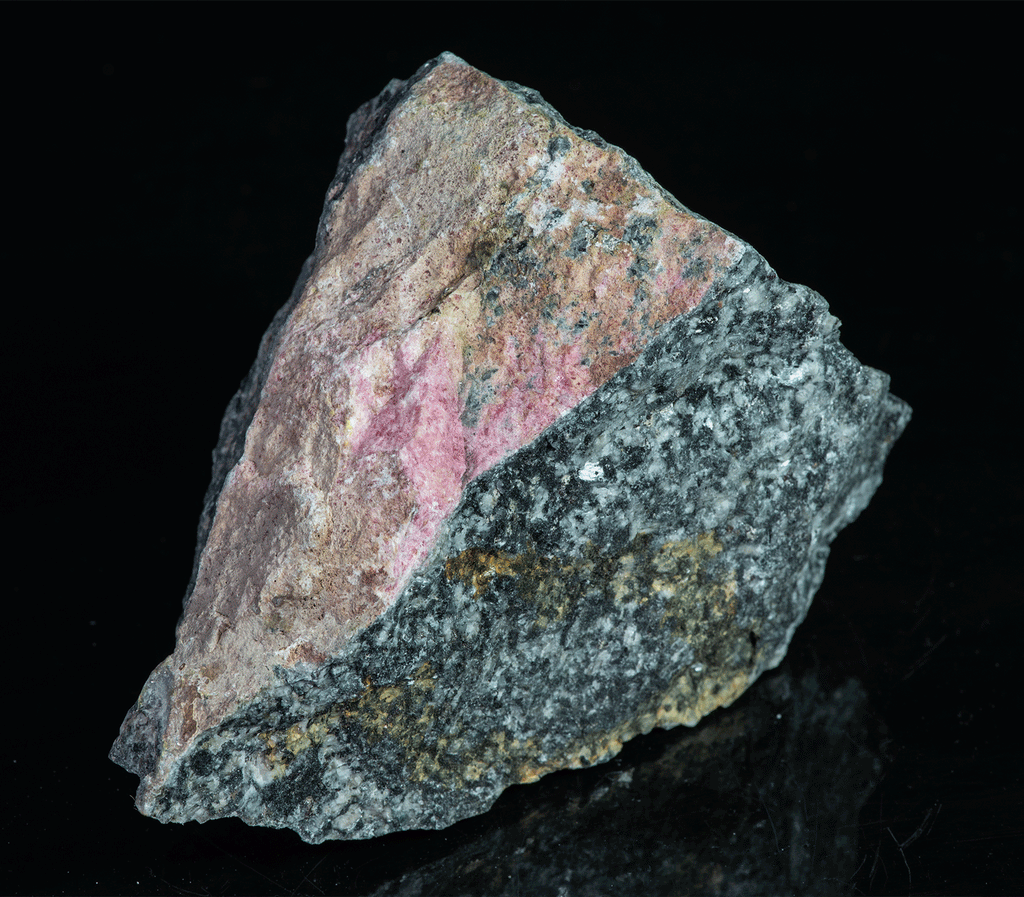 very tenebrescent piece of tugtupite from greenland