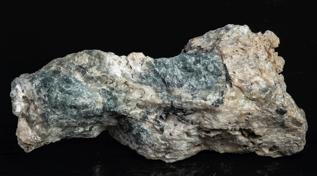 Fluorescent sodalite (Hackmanite) from Greenland with deep tenebrescence.