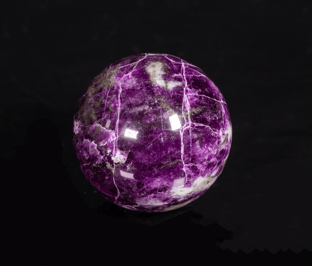 fluorescent sodalite sphere with deep tenebrescence