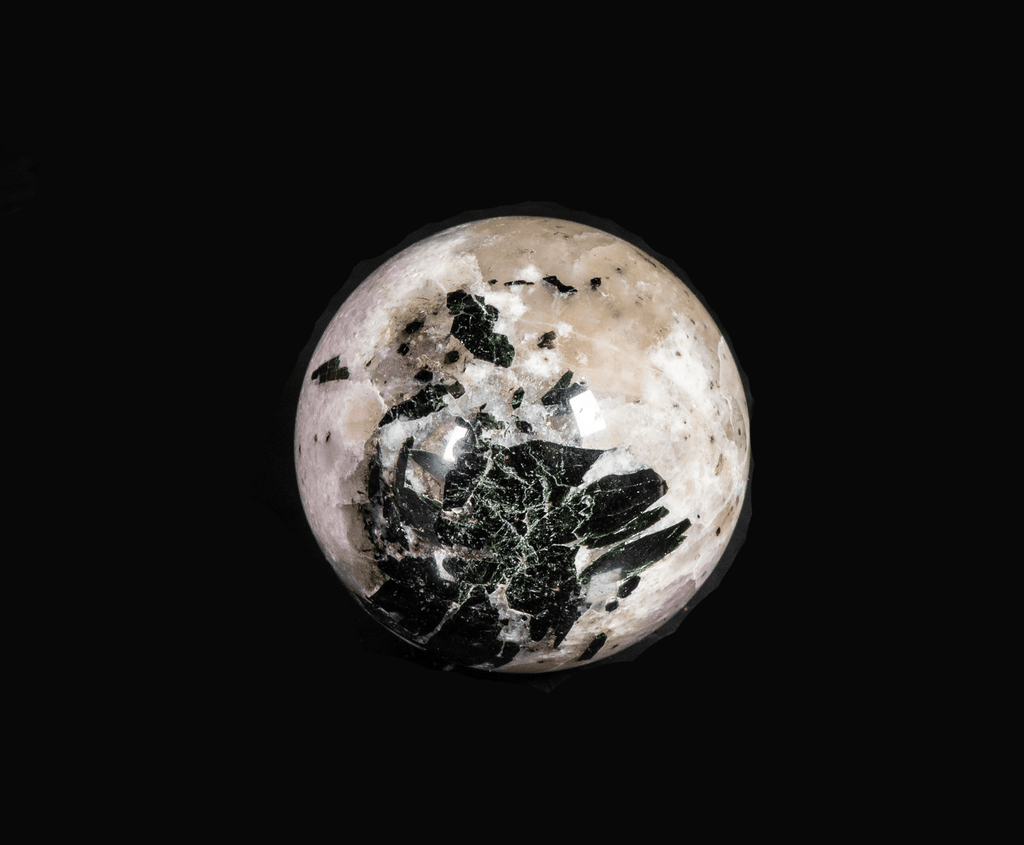 tenebrescent and fluorescent sodalite sphere