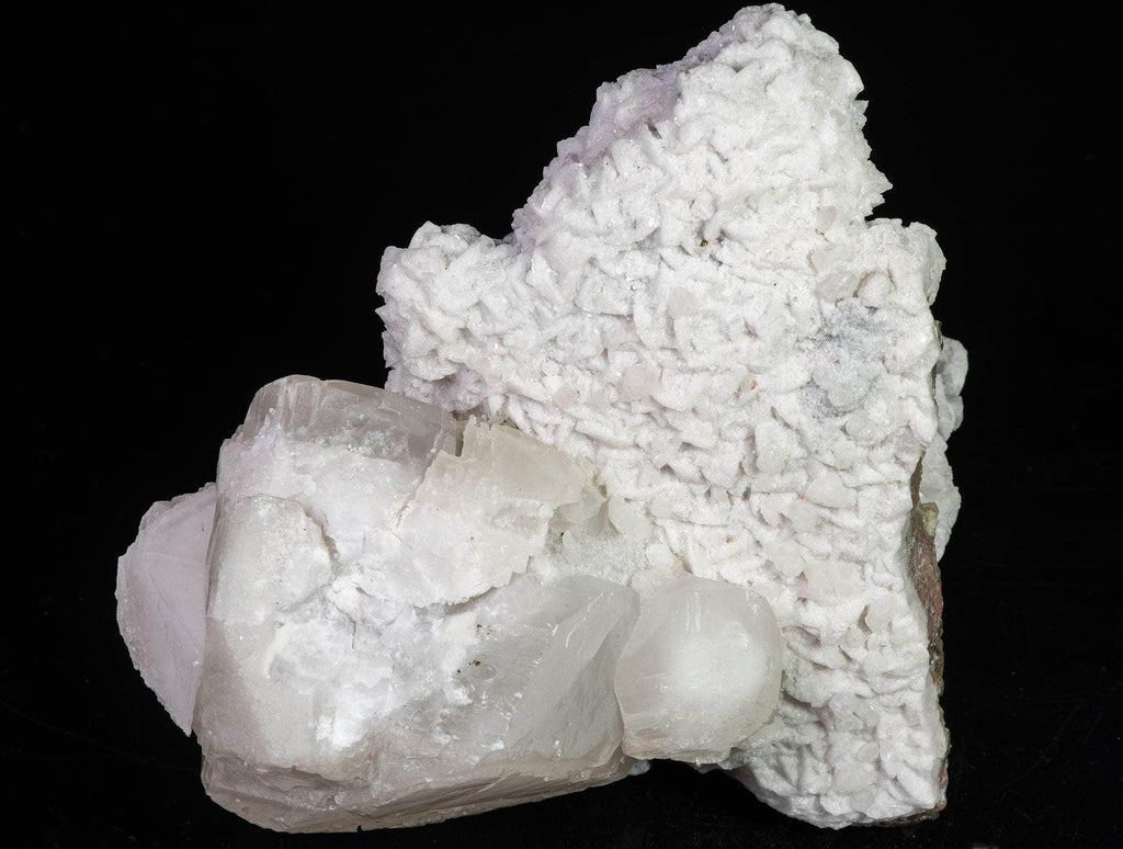  calcite in two different habits along with cubic honey brown fluorite crystals. 