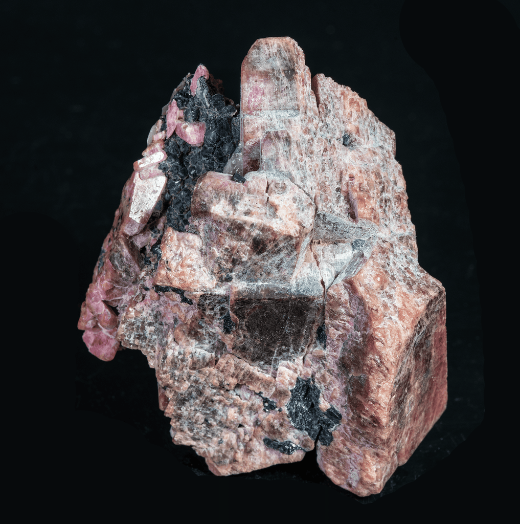 Deep Pink Rhodonite Crystals with Fluorescing Calcite from Franklin Mine