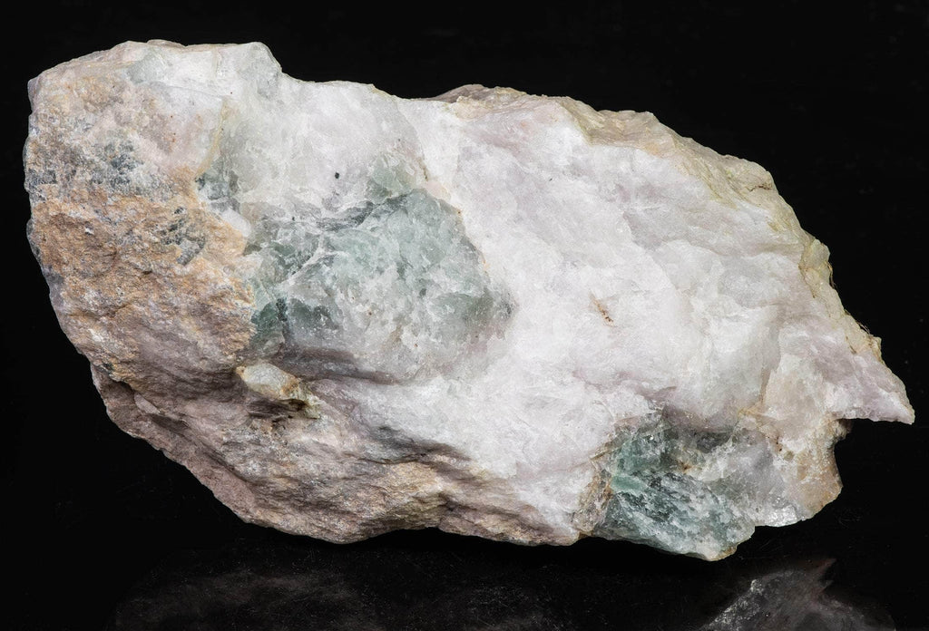 Sodalite (Hackmanite) from Greenland with deep tenebrescence.