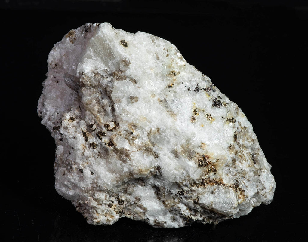A nice specimen with Marialite (scapolite) crystals, fluorescent a bright yellow longwave, on a calcite matrix.