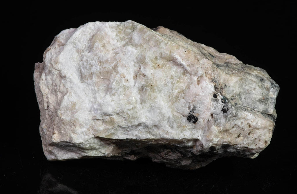 A deeply tenebrescent hackmanite red sodalite specimen from Greenland
