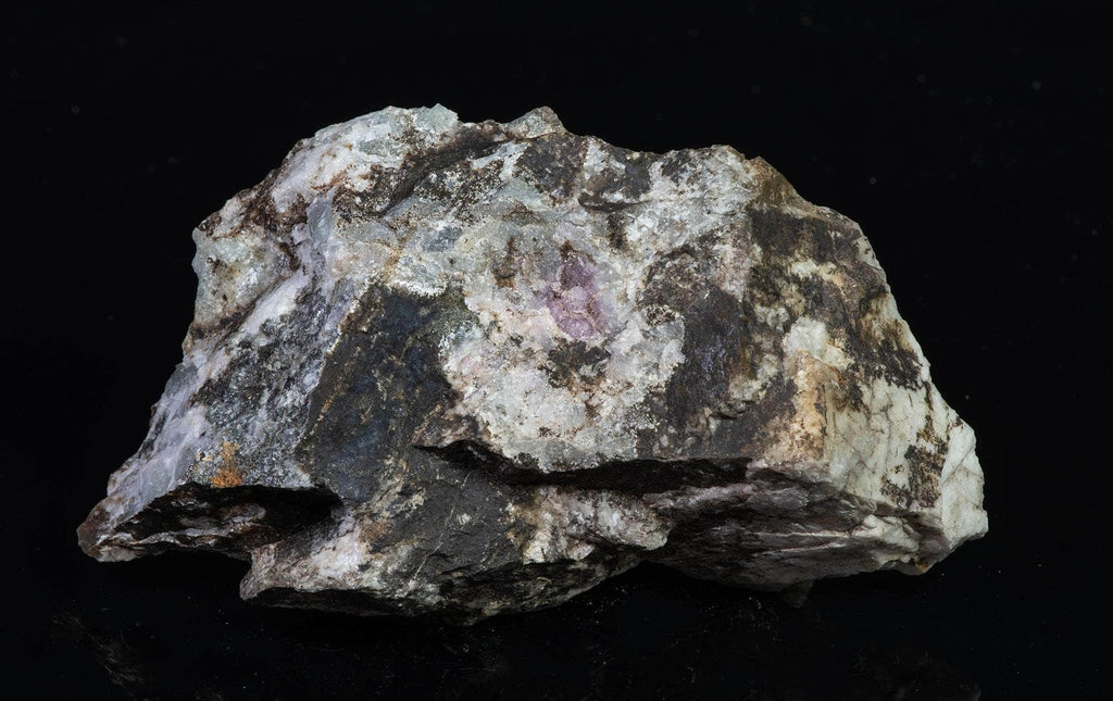 Mineral specimen of very tenebrescent blue sodalite (hackmanite)