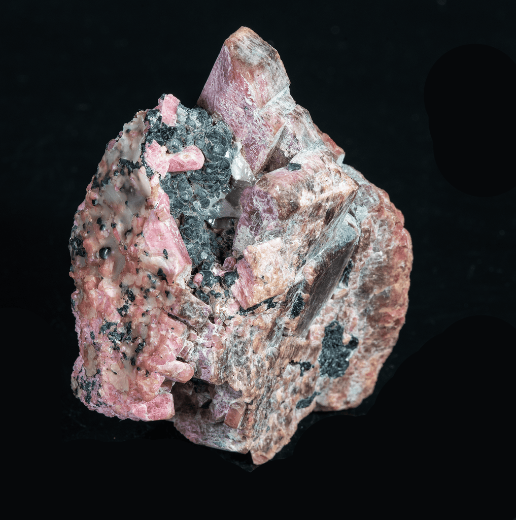 Deep Pink Rhodonite Crystals with Fluorescing Calcite from Franklin Mine