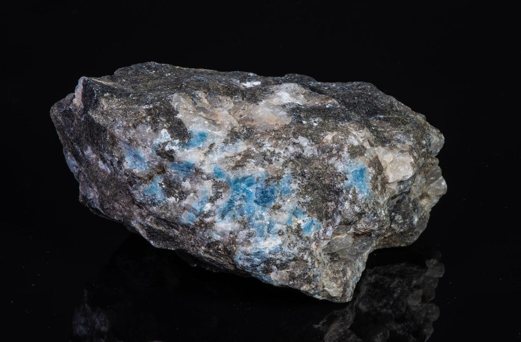 A piece of blue sodalite fluorescent under UV from Greenland