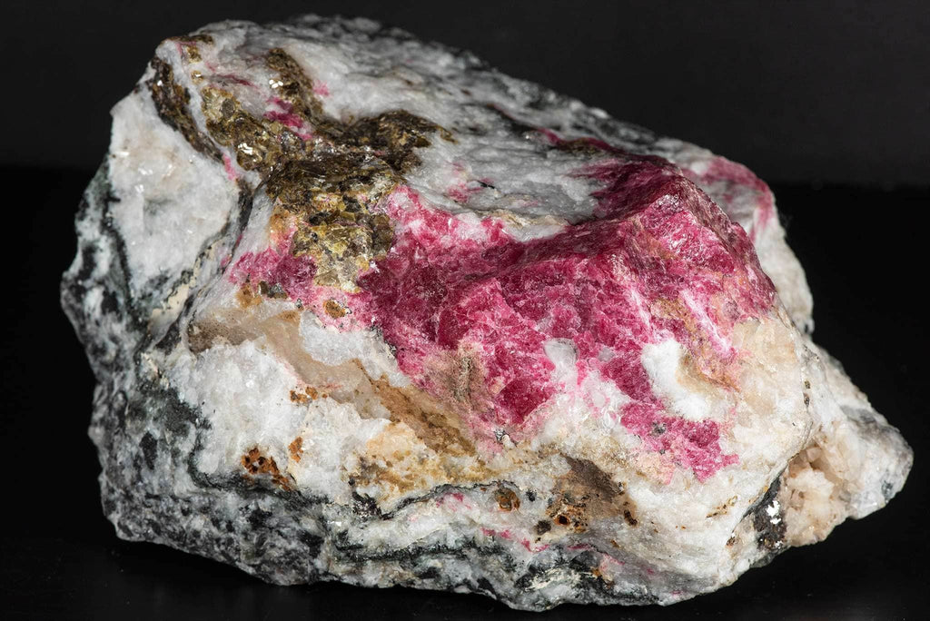A piece of gem tugtupite from Greenland
