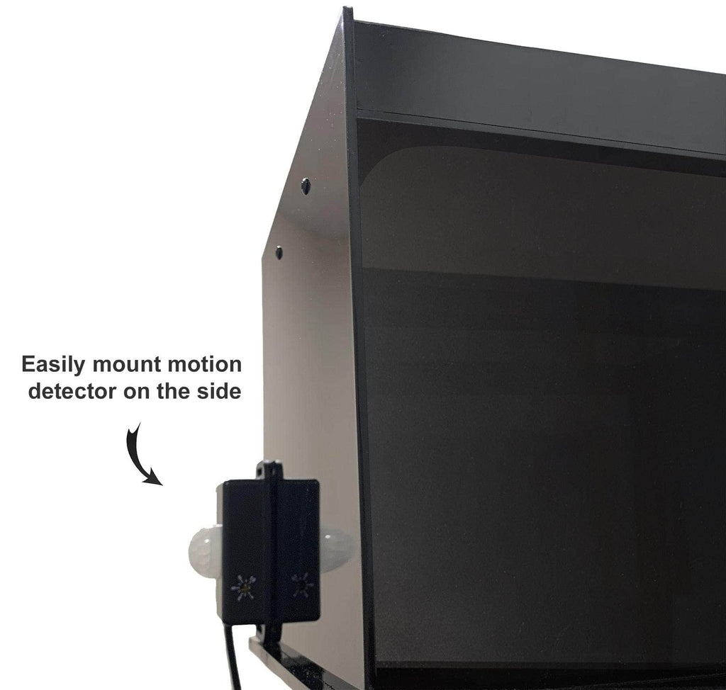 Fluorescent mineral display case with motion detector