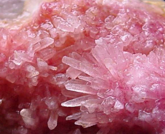 Close up of pink tugtupite crystals