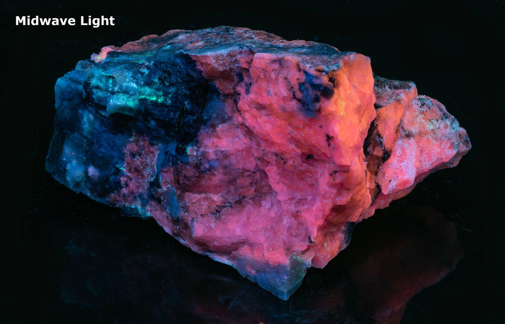A great piece of sodalite (hackmanite) from Greenland with bright red-orange fluorescence under shortwave.