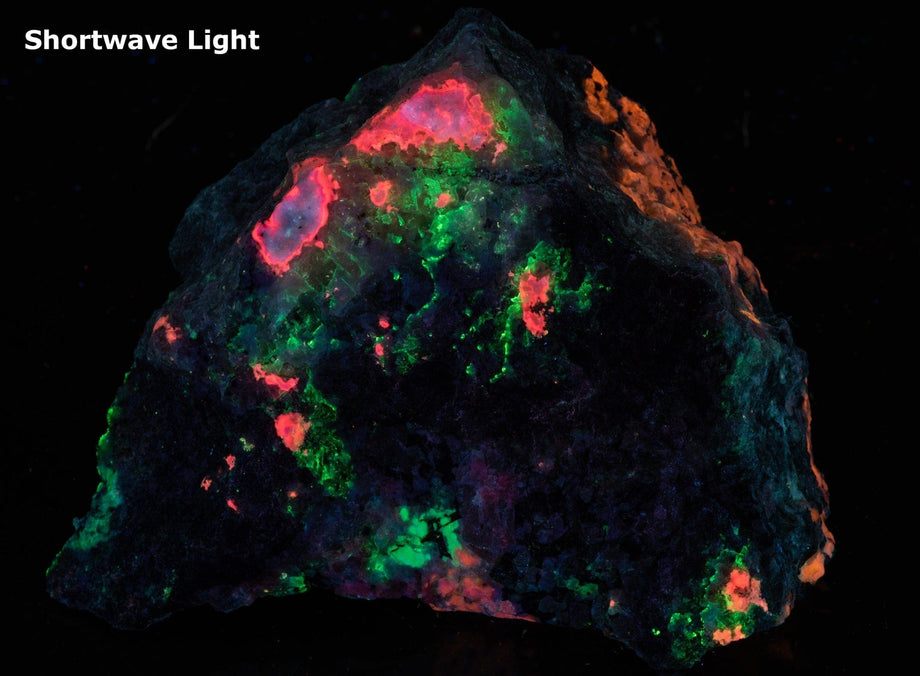 A large, tenebrescent fantasy rock with spectacular veined