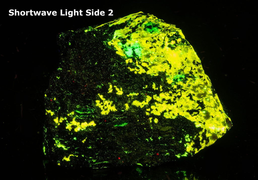 Bright yellow esperite with green willemite and minor calcite (red) from the Parker shaft in Franklin, NJ