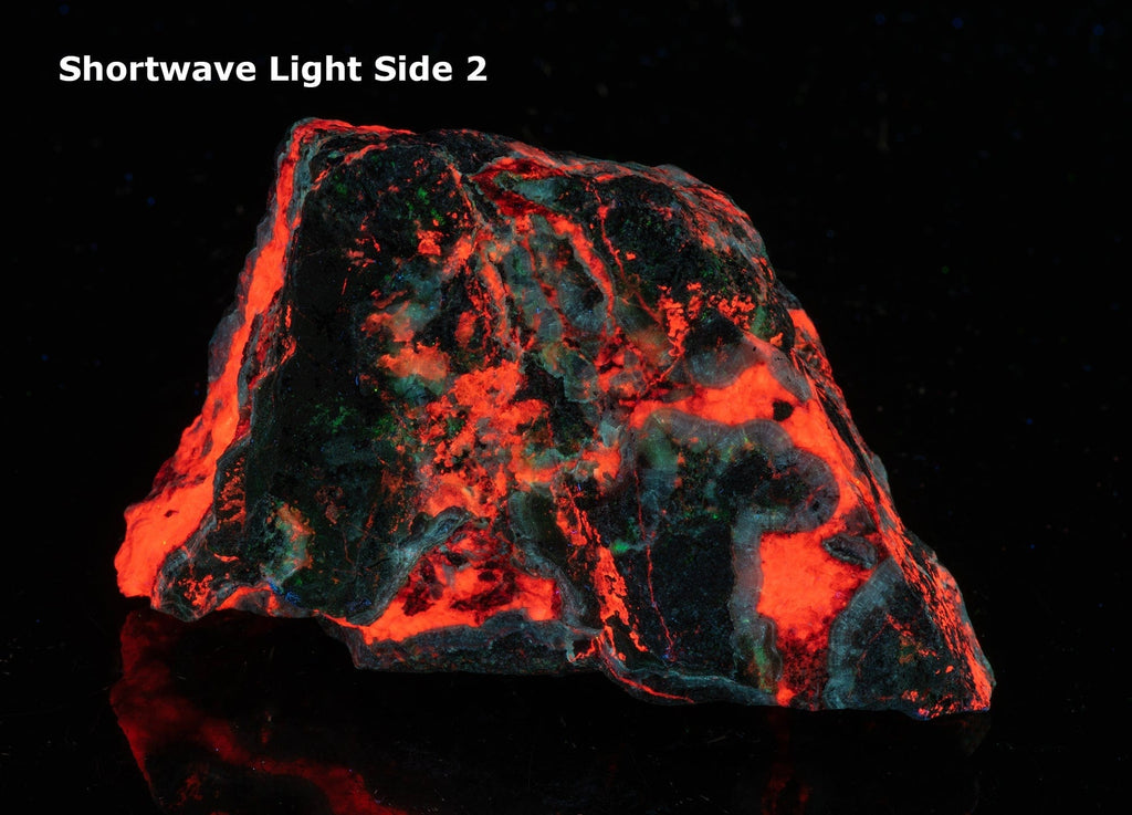 A very phosphorescent piece of calcite and willemite fluorescent under UV light