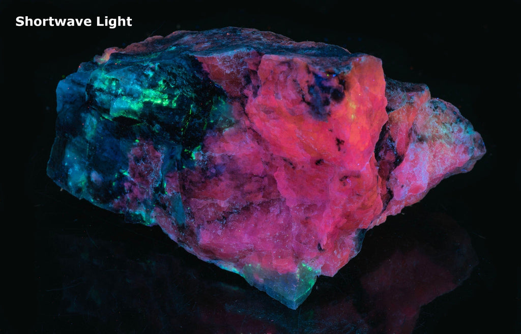 A great piece of sodalite (hackmanite) from Greenland with bright red-orange fluorescence under shortwave.