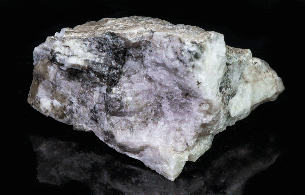 A great piece of sodalite (hackmanite) from Greenland with bright red-orange fluorescence under shortwave.