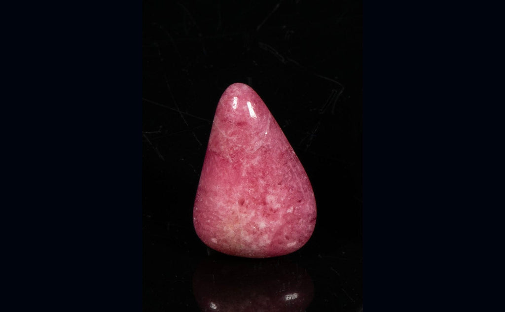 A Piece of Tumbled Tugtupite Stone
