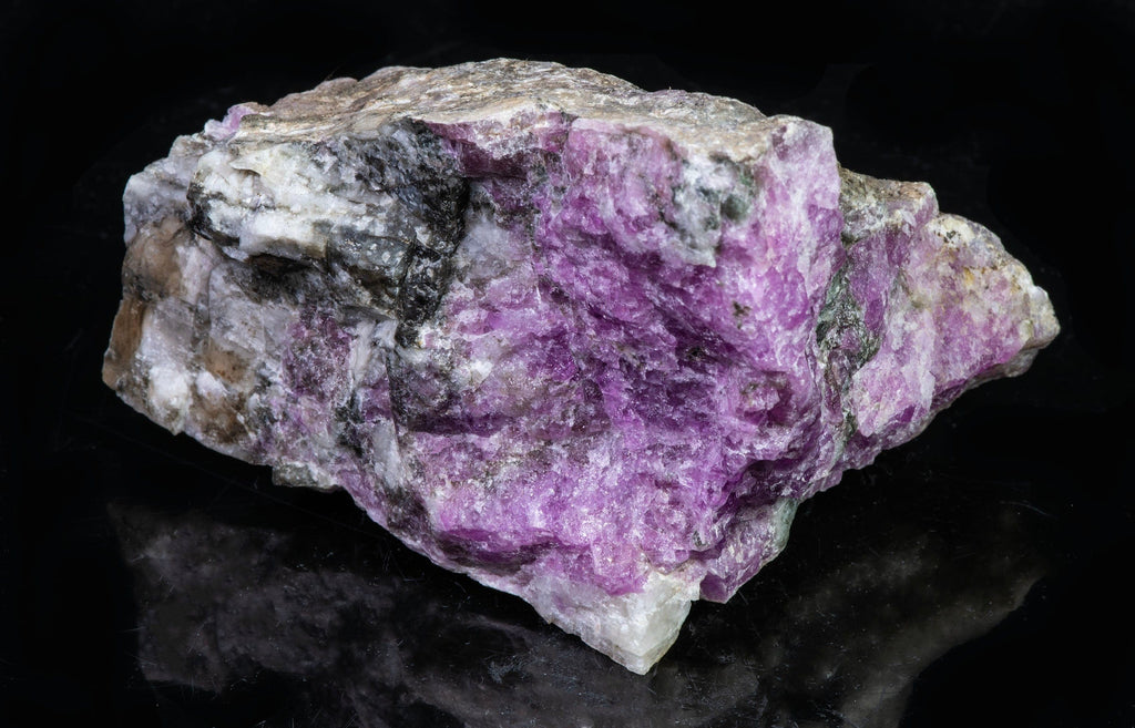 A great piece of sodalite (hackmanite) from Greenland with bright red-orange fluorescence under shortwave.