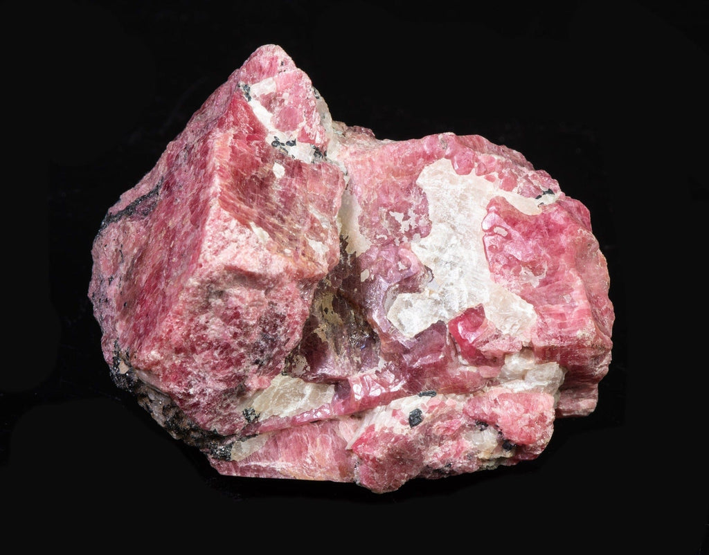A Pink Rhodonite Crystal with Fluorescing Calcite from Franklin Mine