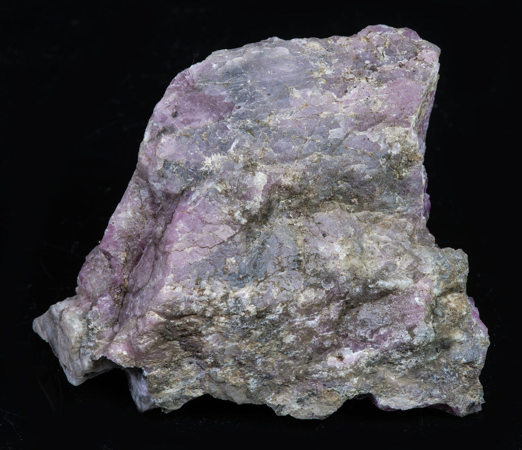 A great piece of sodalite (hackmanite) from Greenland with bright red-orange fluorescence under shortwave.