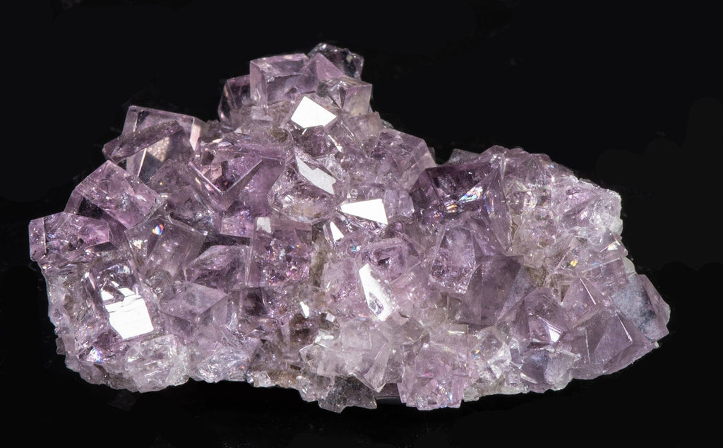 A beautiful specimen with well-formed purple fluorite crystals